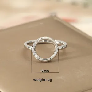 Minimalist geometric circular hollow ring with fine zircons on high-quality leather base