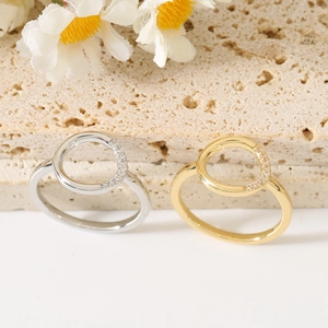Minimalist geometric hollow rings with inlaid diamonds in gold and silver finish