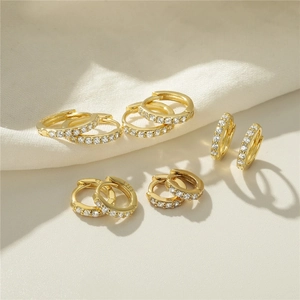 Set of gold S925 sterling silver hoop earrings with sparkling cubic zirconia stones