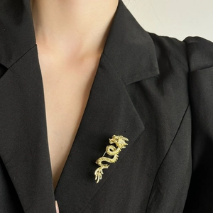 Exquisite golden dragon brooch with zircon inlay on black blazer lapel for luxury style