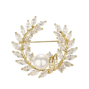 Gouden tarwe broche met marquise zirkonia en een grote witte parel in het middenstuk