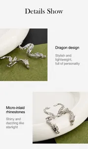 Macro detail of dragon ear cuff with white zircon pavé micro-inlay in silver finish