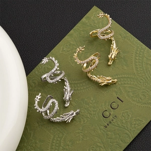 Exquisite Chinese dragon ear cuffs set with white zircons in gold and silver finish