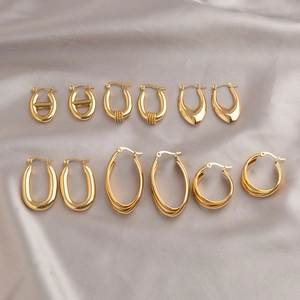 Set of six pairs of elegant geometric oval gold earrings in assorted modern styles