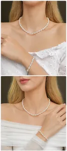 Detail showing French vintage pearl necklace and bracelet set with elegant glossy finish