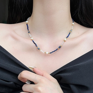Vintage style handmade necklace with blue natural stone, pearls, and crystal beads