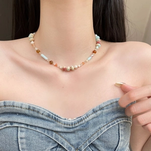 Beaded necklace with natural stones, freshwater pearls and colorful glass beads for women