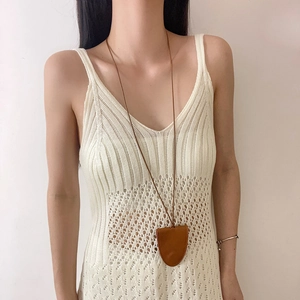 Minimalist brown leather pendant necklace for women with fine stitching on long cord