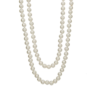 French vintage double-layered long pearl necklace with creamy white round pearls on white