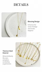Detail view of gold titanium steel necklaces with Fu character and gold brick pendants