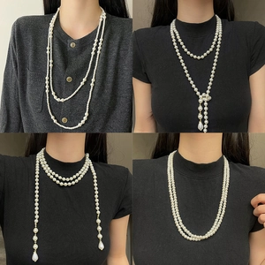 Lange meerlaagse parelketting met elegante waterdruppel hanger voor dames
