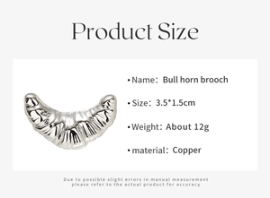 Detail showing bull horn brooch made of copper with silver plating and dimensions