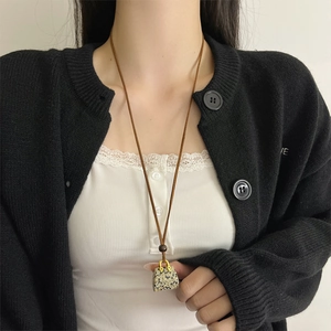 Vintage style tiger eye stone handbag pendant necklace with gold metal handle and long cord