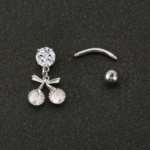 Surgical steel cherry belly button ring with sparkling crystals on black background