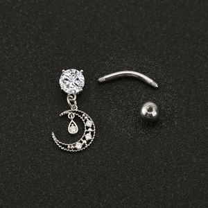 Silver moon and teardrop zircon navel ring with crystal accents on a black background