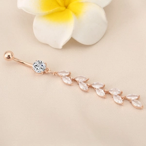 Detail of rose gold belly ring with leaf tassel and marquise cut cubic zirconia stones