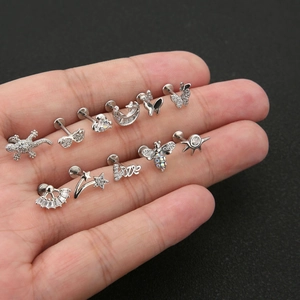 Lot de 11 piercings argentés aux motifs abeille, papillon et lune sertis de zircons