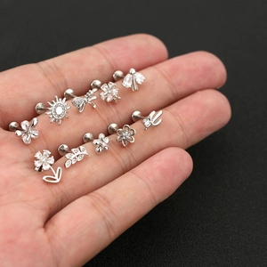 Polished surgical steel flower piercing set with clear zircon stones for ears and lips