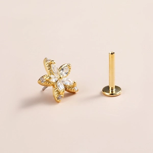 Flat back flower labret stud with gold plated setting and marquise cut cubic zirconia