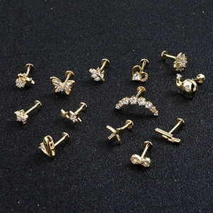 Gouden roestvrijstalen labret piercingset met vormen zoals vlinder en hart met zirkonia steen