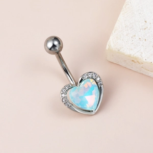 Surgical steel curved belly ring featuring a pale blue heart opal and sparkling zircon accents