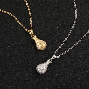 Luxurious money bag pendant necklace with cubic zirconia dollar sign on black background