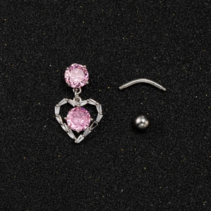 Detail view of heart-shaped belly button ring with pink zircon and detachable silver bar