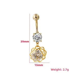 Vista detallada del piercing para el ombligo dorado con longitud de 39mm y colgante rosa