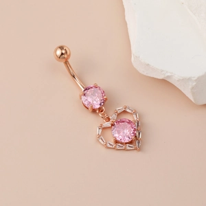 Rose gold heart belly button ring with pink zircon pendant and baguette stone border