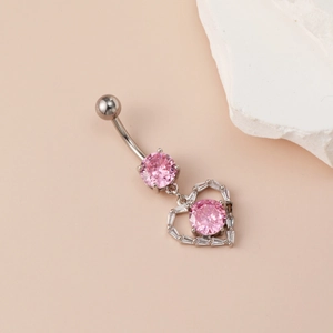 Silver belly button ring with pink heart pendant and baguette crystal accents