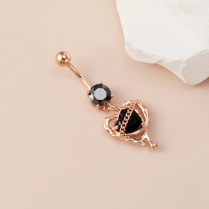Rose gold heart belly button ring with black stones and punk style chain detail