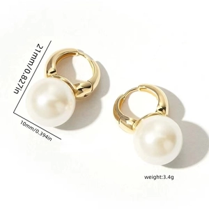 Detail view of pearl earrings with 21mm height and 10mm diameter size measurements