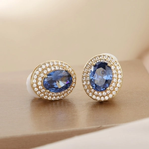 Elegante Vintage-Goldohrringe mit ovalem blauem Saphir und doppeltem Kristall-Halo