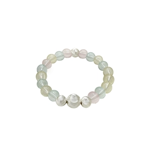 Colorful macaron crystal beaded bracelet with textured silver metal accents on white background