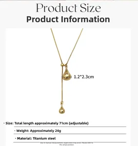 Detailed view of adjustable golden teardrop pendant with dimensions 1.2x2.3cm and 71cm chain
