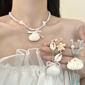 Ensemble collier océan avec étoile de mer coquillages et perles pour style vacances