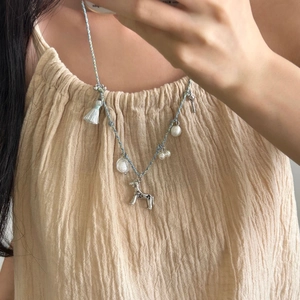 Collier bohème en corde avec pendentif cheval argenté, perles et glands pour femmes