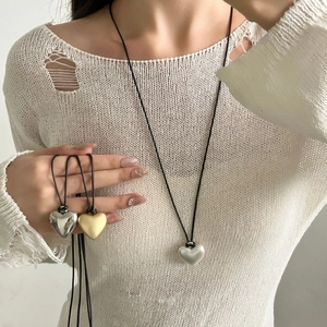 Gepolijste hartvormige hanger ketting met minimalistisch koord in goud en zilver