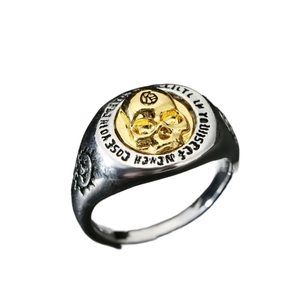 Retro two-tone skull ring for men with vintage relief patterns and open band design