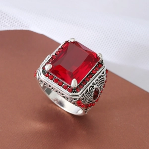 Vintage men's ring with rectangle red gemstone and intricate hollow silver textures