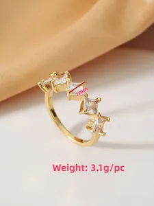 Macro detail of gold ring featuring 7mm square cubic zirconia and 3.1g weight display