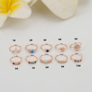Set di 10 anelli per piercing in oro rosa con zirconi colorati in varie forme