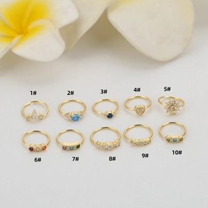 Set di 10 anelli per il naso placcati oro con zirconi colorati in varie forme
