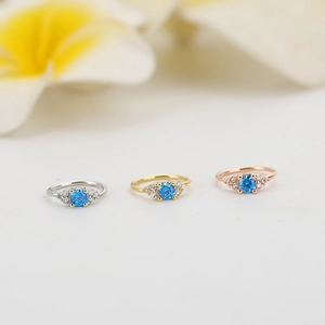 Anelli per il naso in argento, oro e oro rosa con pietra blu e diamanti laterali