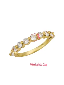 Detail view of gold ring with 3mm round clear cubic zirconia stones and 2g weight