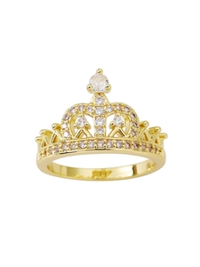 Macro shot of crown ring with sparkling round zircons in polished golden plating