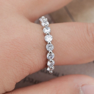 Elegant silver paved band ring featuring shimmering round cut stones for a luxury fashion look