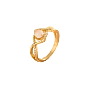 Elegant gold ring featuring a round pink moonstone center and crystal accents