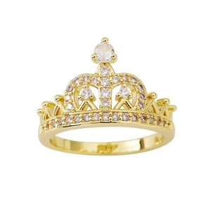 Elegant gold crown ring with sparkling crystals and a large center stone on white background