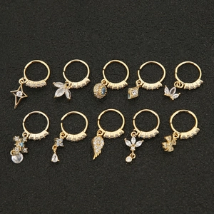 10-teiliges Set vergoldeter Piercings mit Zirkonia-Anhängern und verschiedenen Symbolen
